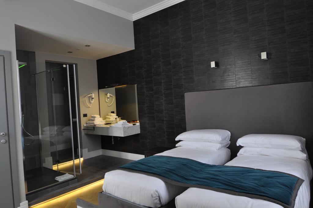 เพลซ 24 สวีท แอนด์ เวลเนส Hotel โรม ห้อง รูปภาพ