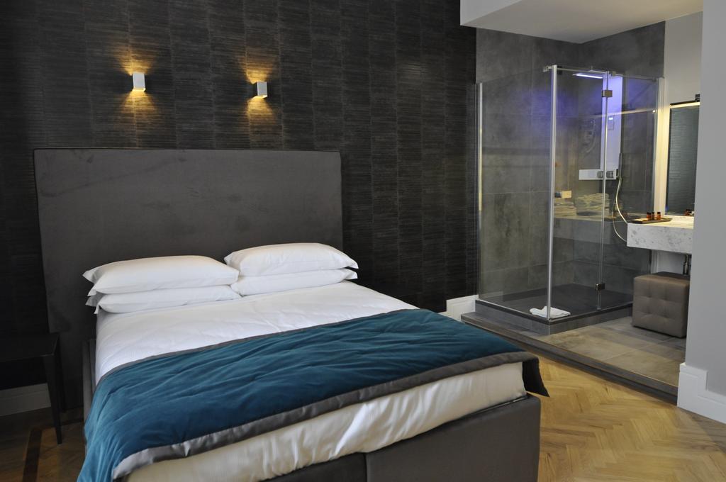 เพลซ 24 สวีท แอนด์ เวลเนส Hotel โรม ห้อง รูปภาพ